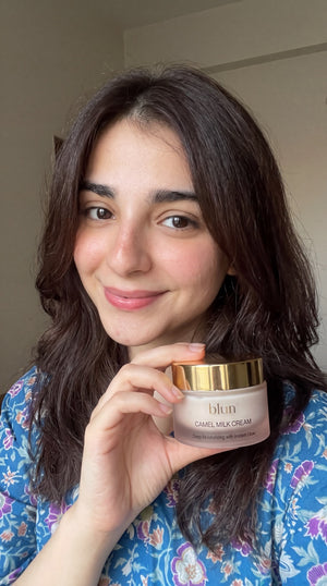 Blun Camel Milk Cream held at home