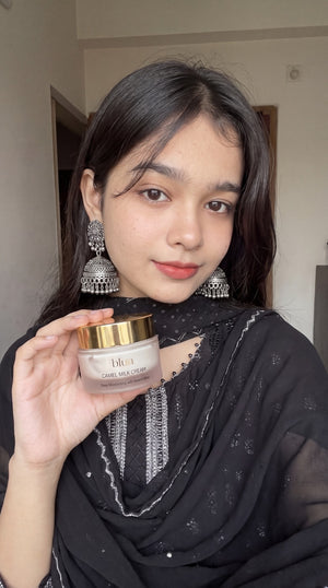 Blun Camel Milk Cream held at home