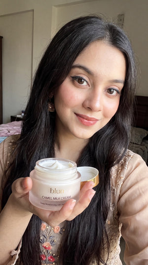 Blun Camel Milk Cream held at home