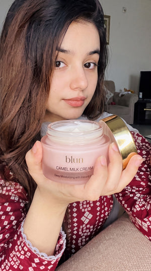Blun Camel Milk Cream held at home